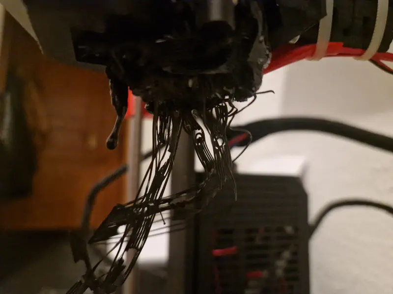 A photo of a fucked-up extruder [2].