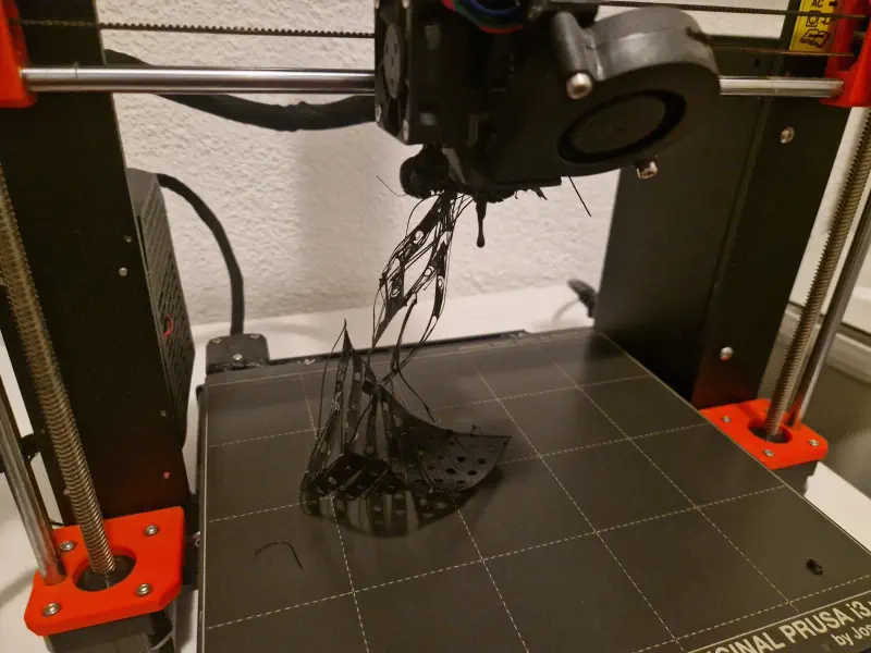 A photo of a fucked-up extruder [1].