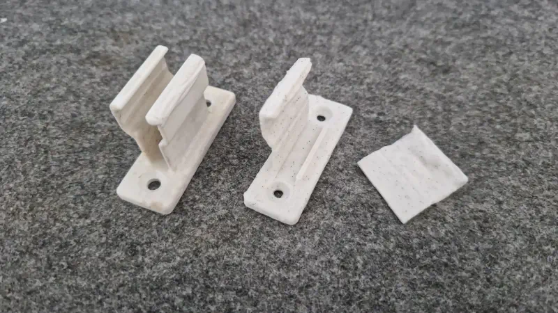 A working holder, and the broken one.