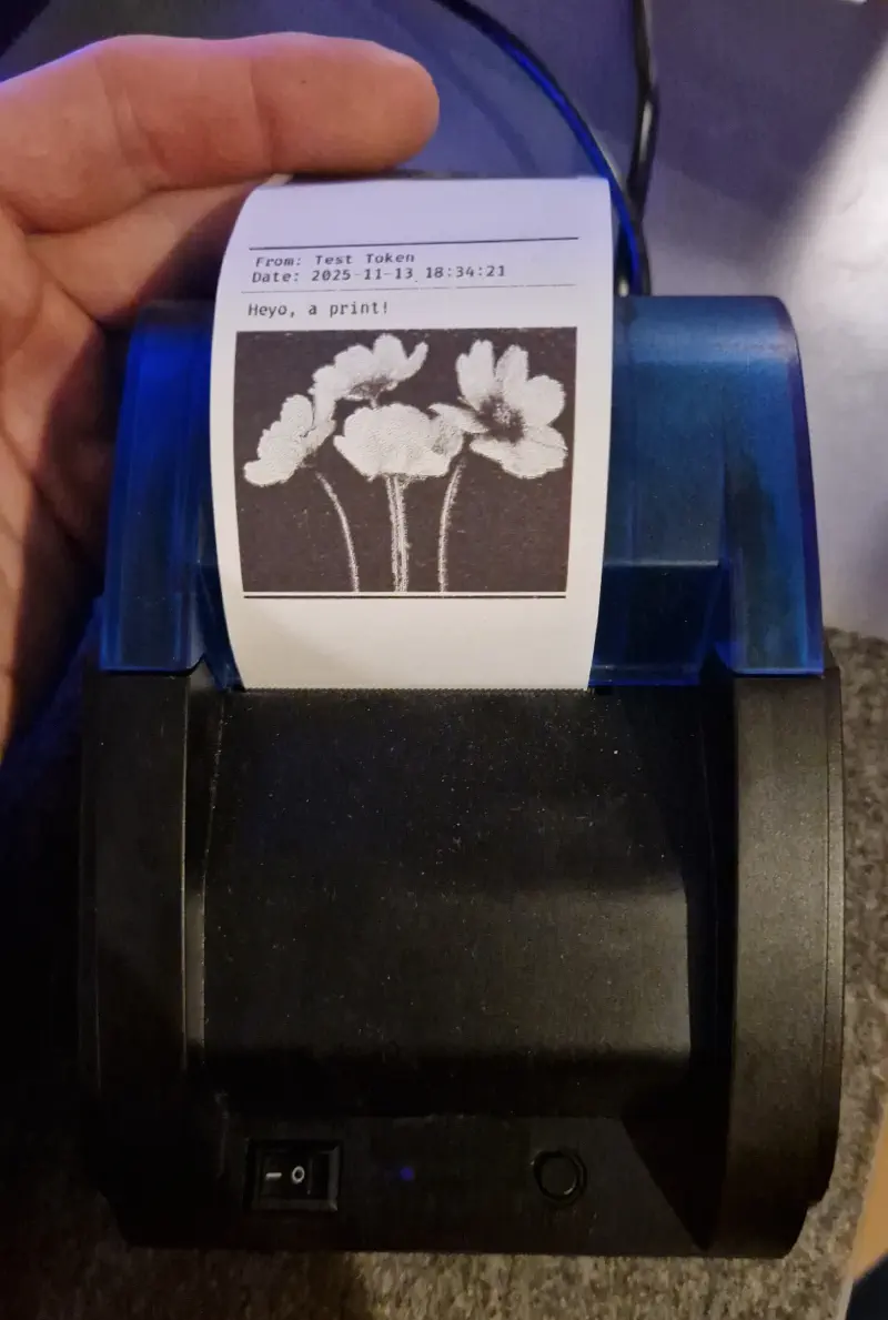 Receipt printer with a sample print.